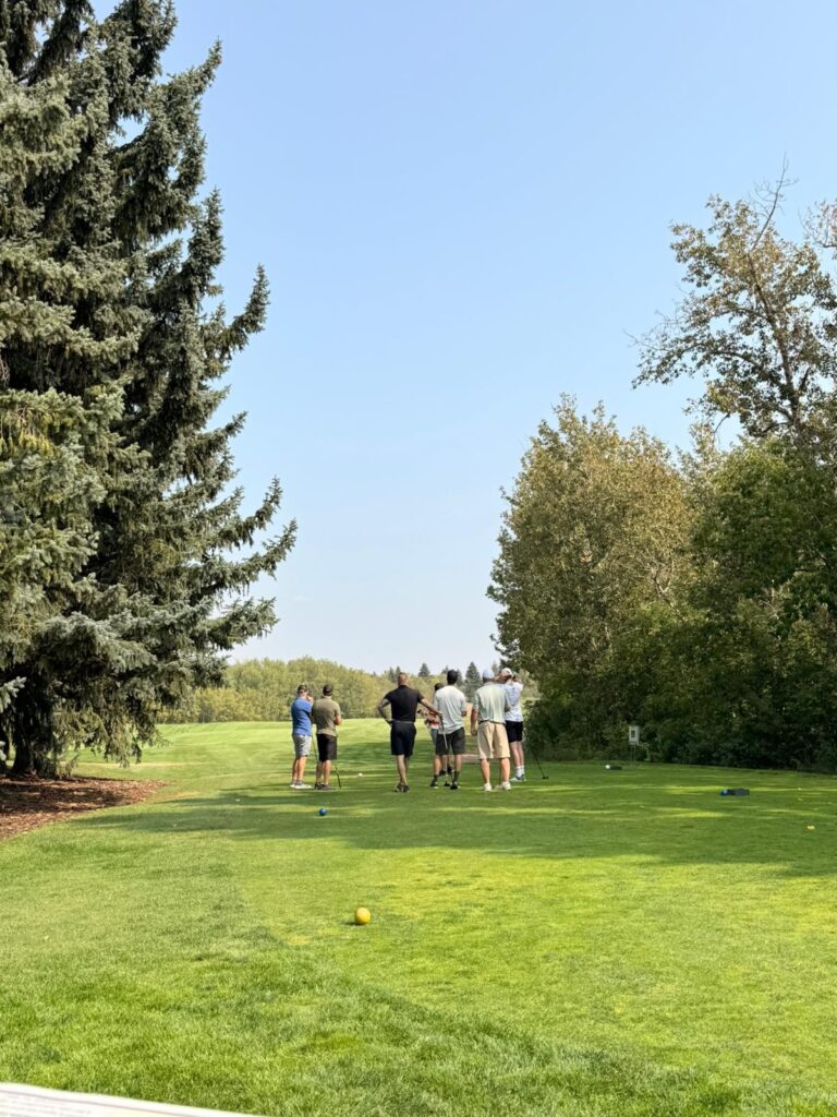 Stratchona firefighter golfers