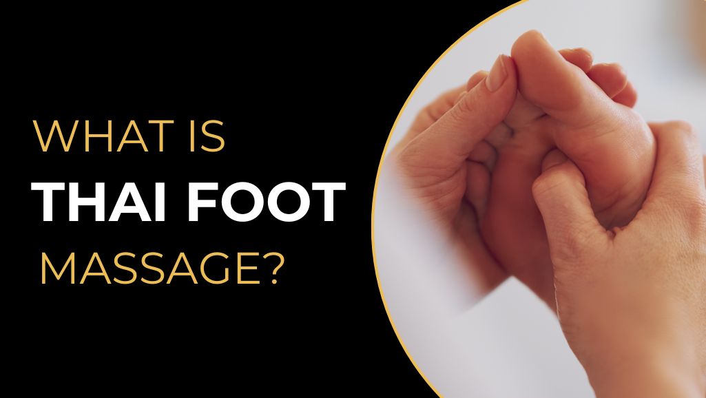 Massage therapist's hands pressing into the sole and toes of a client's foot during a Thai foot massage